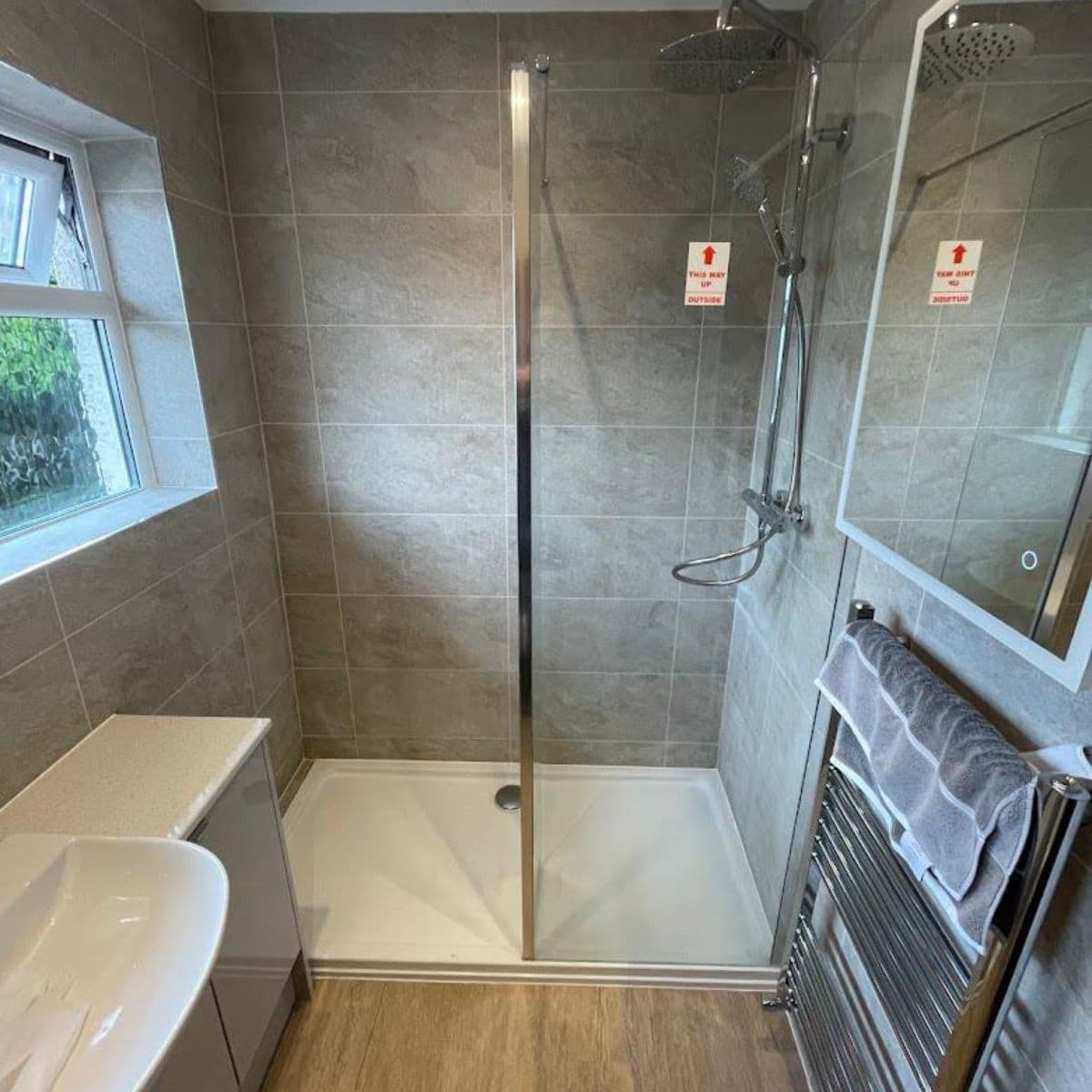 Modern bathroom renovation in Cardiff completed by JM Plumbing Services